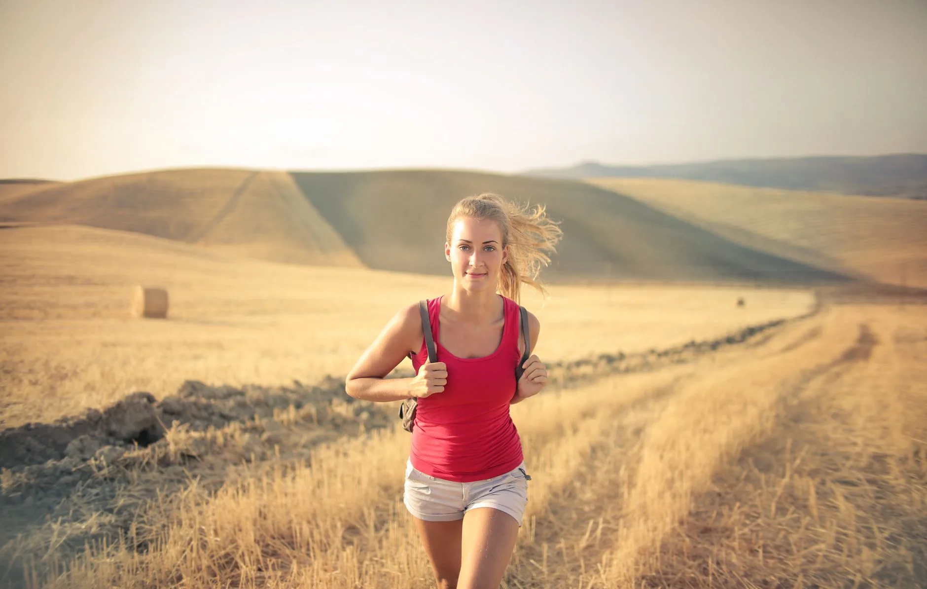 A runner at sunrise — pressing forward when your own strength runs out