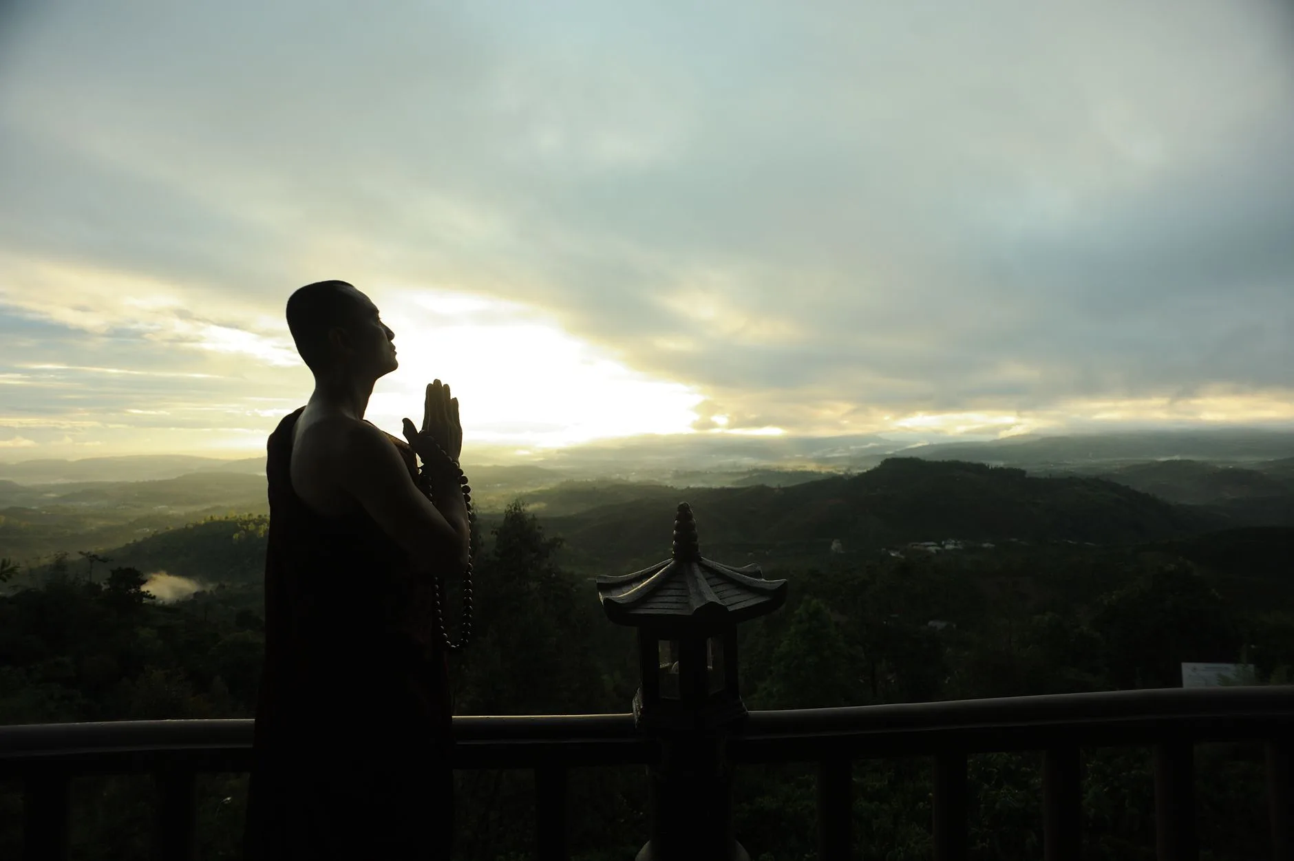 Man praying at sunrise, seeking God before the day gets loud