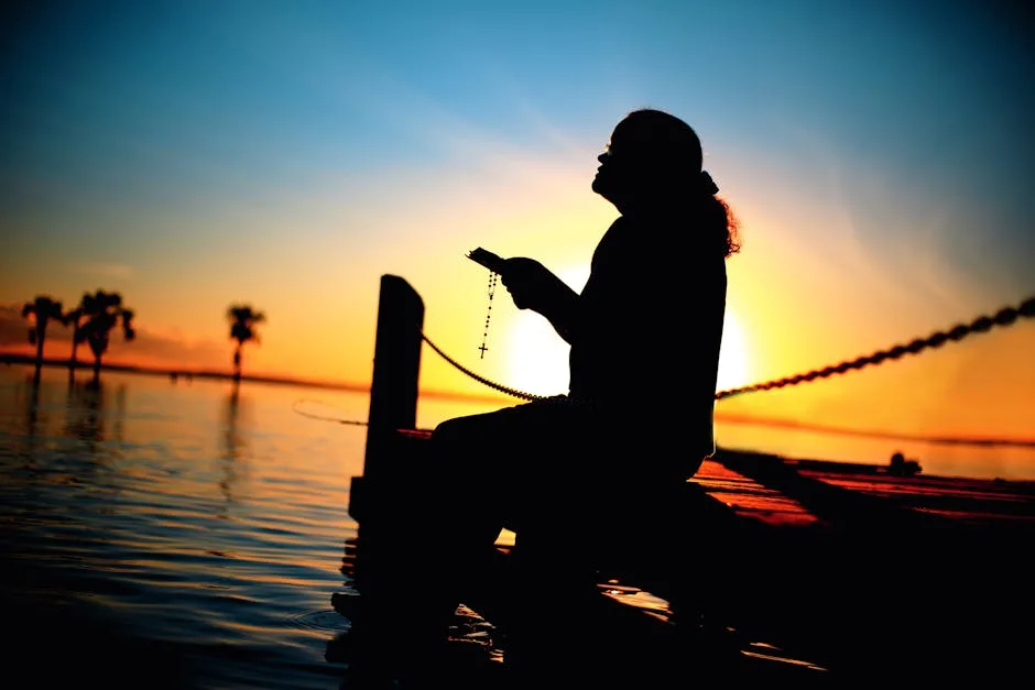Silhouette of a woman praying at sunset — ordinary by the world's standards, extraordinary in God's economy